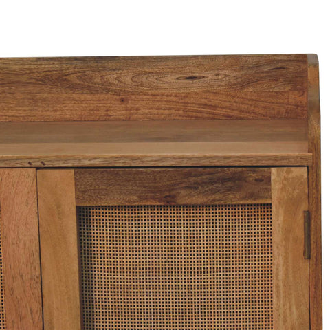 Larissa t-bar raised cabinet with rustic natural wood finish and cane weave panels showing wood grain texture