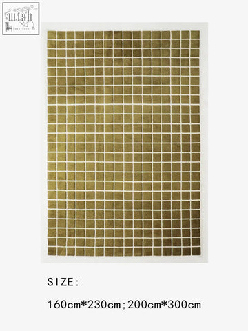 Gold-colored mosaic tile sheet with small squares and white grout perfect for a coffee table set or table set