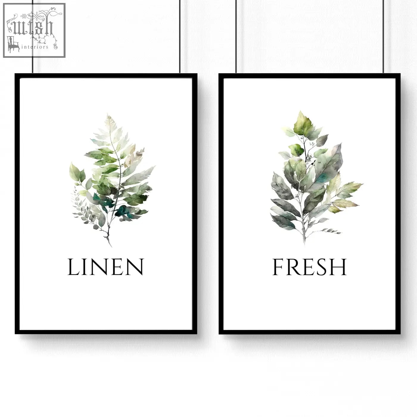 Two framed laundry room art prints with watercolor leaf illustrations in soft greens and grays labeled linen and fresh