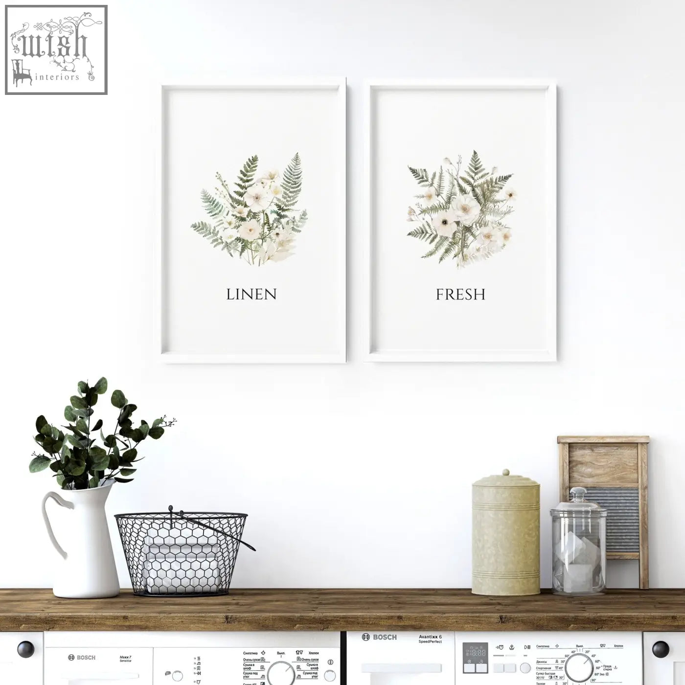 Two framed botanical laundry room pictures with white flower and green fern wall art prints labeled linen and fresh
