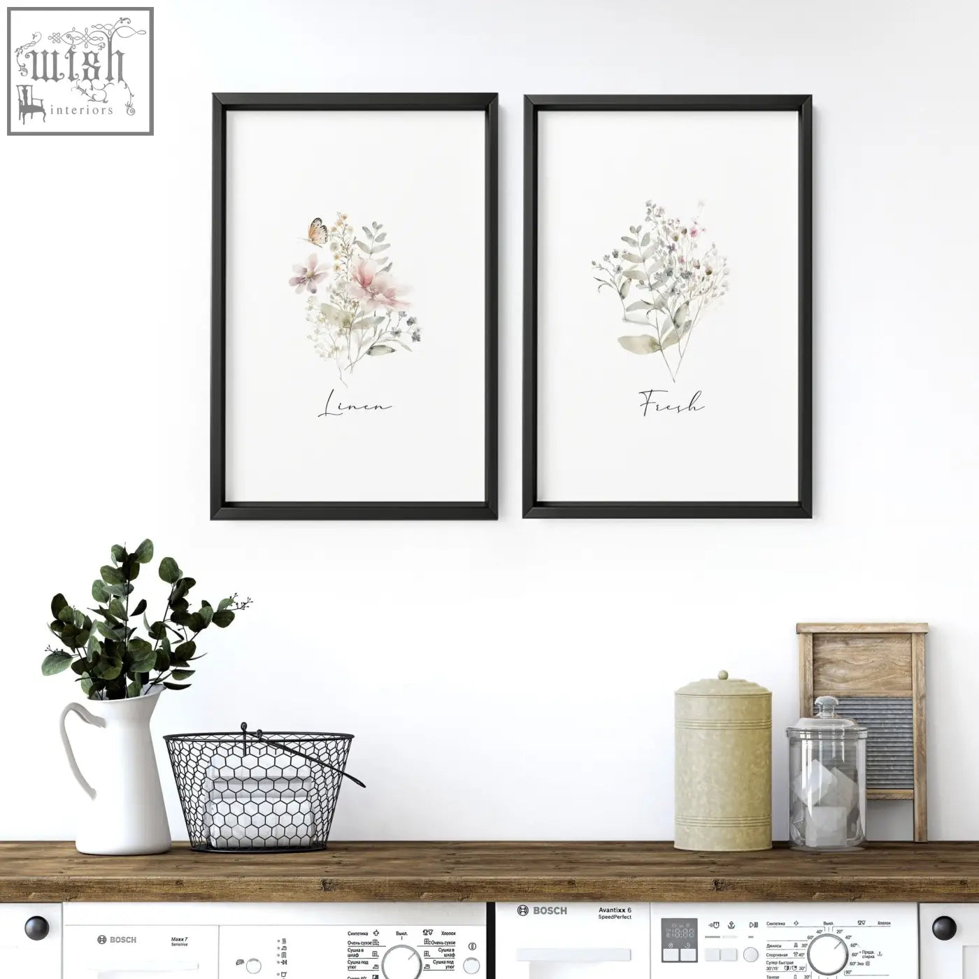 Two black-framed laundry room posters with delicate watercolor flowers in soft pink and green hues on white background