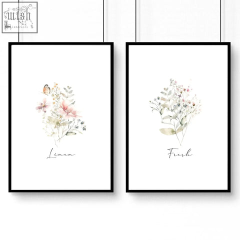 Two black-framed watercolor floral laundry room posters with pastel pink and green botanical prints for room decor