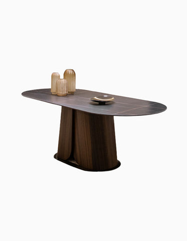Modern lauren dining table with dark sintered stone oval top and sculpted wooden base for stylish dining spaces