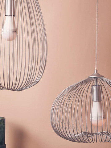 Lavis 1 bulb silver finish pendant light with a silver wire cage and warm glowing bulb silver finish pendant