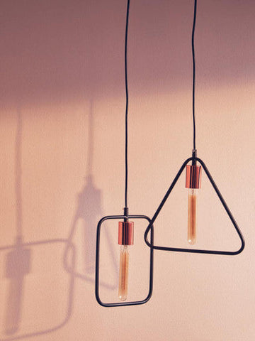 Lavis black and copper finish pendant light with black metal geometric design and copper finish pendant accents and exposed bulbs