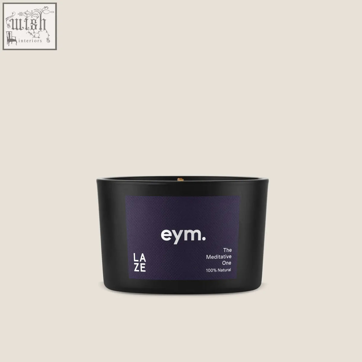 Black cylindrical mini candle in a matte container with a dark purple label and eym branding titled laze mini candle