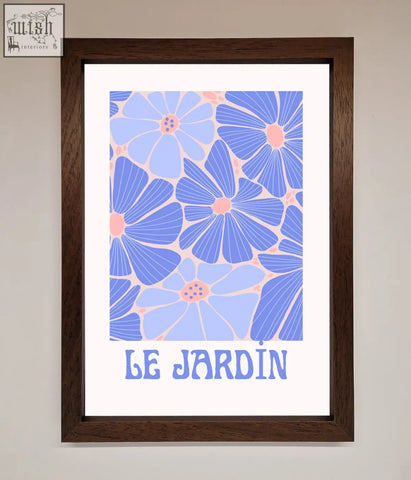 A jardin blue framed poster with a stylized blue and pink floral pattern and the text le jardin below