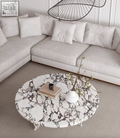 Leanna coffee table round coffee table with white and black marble top and slender legs for stylish living rooms