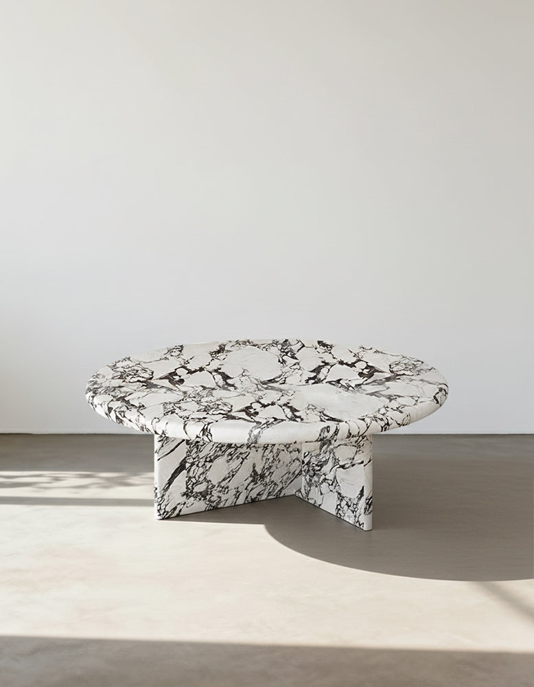 Leanna coffee table round coffee table with sleek white and black marble top and matching base