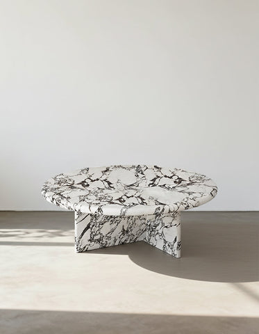 Leanna coffee table round coffee table with sleek white and black marble top and matching base