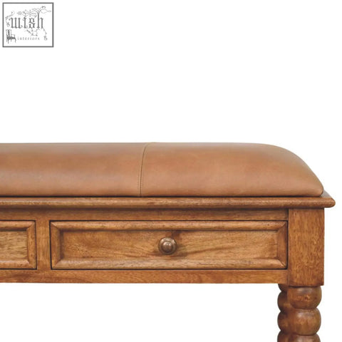 Brown leather spindle bench with wooden frame, turned legs, and two drawers for stylish storage seating