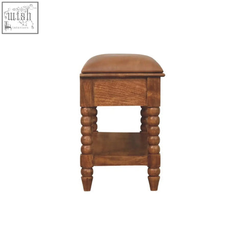 Brown wooden leather spindle bench with cushioned top and turned legs for stylish seating and decor