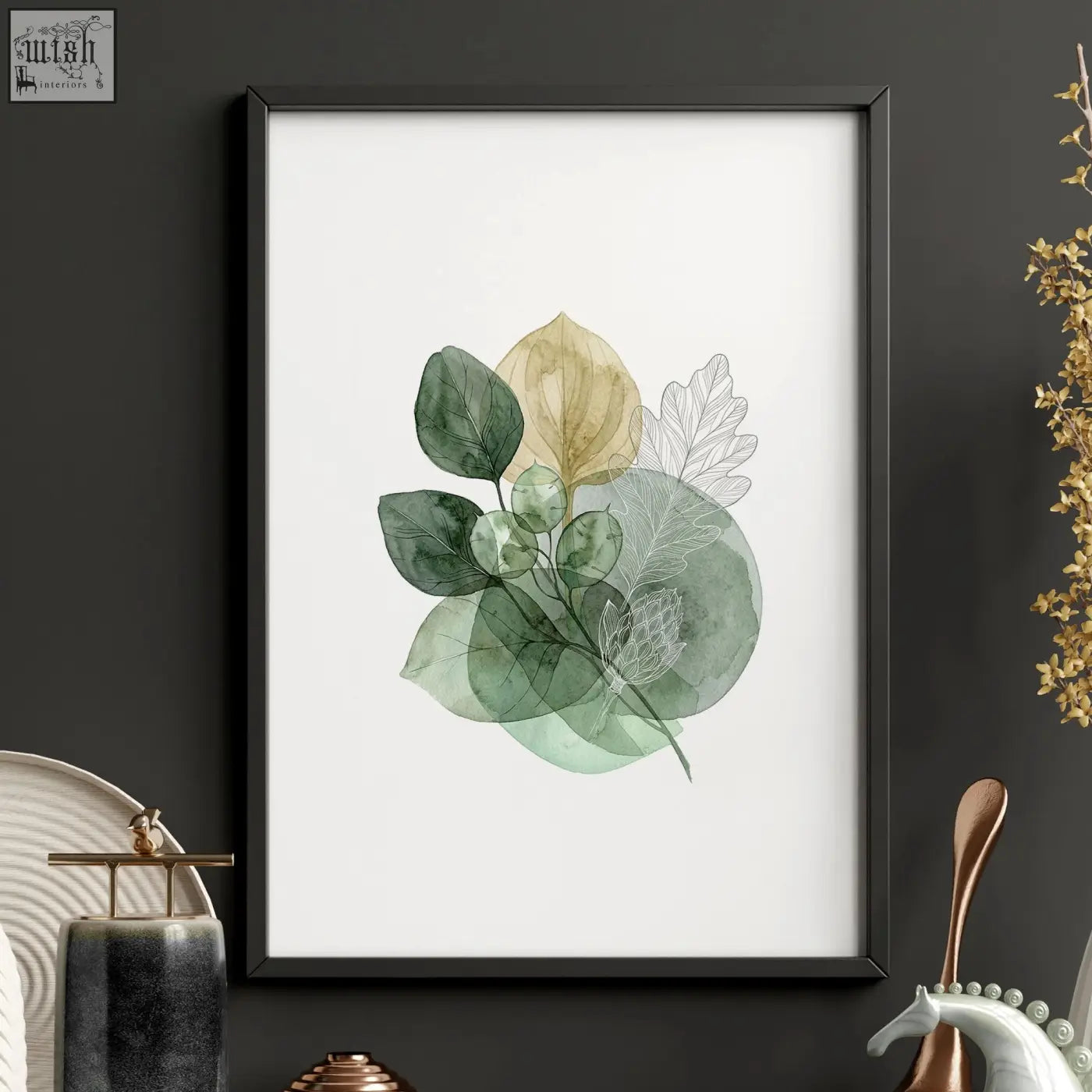 A framed leaves print watercolor botanical set featuring warm gold-toned layered green leaves in sleek black frame