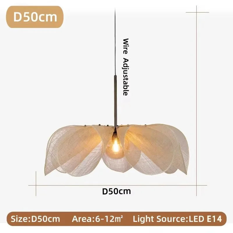 A delicate cream-colored fabric led flower pendant light with a slender black wire perfect for living room use
