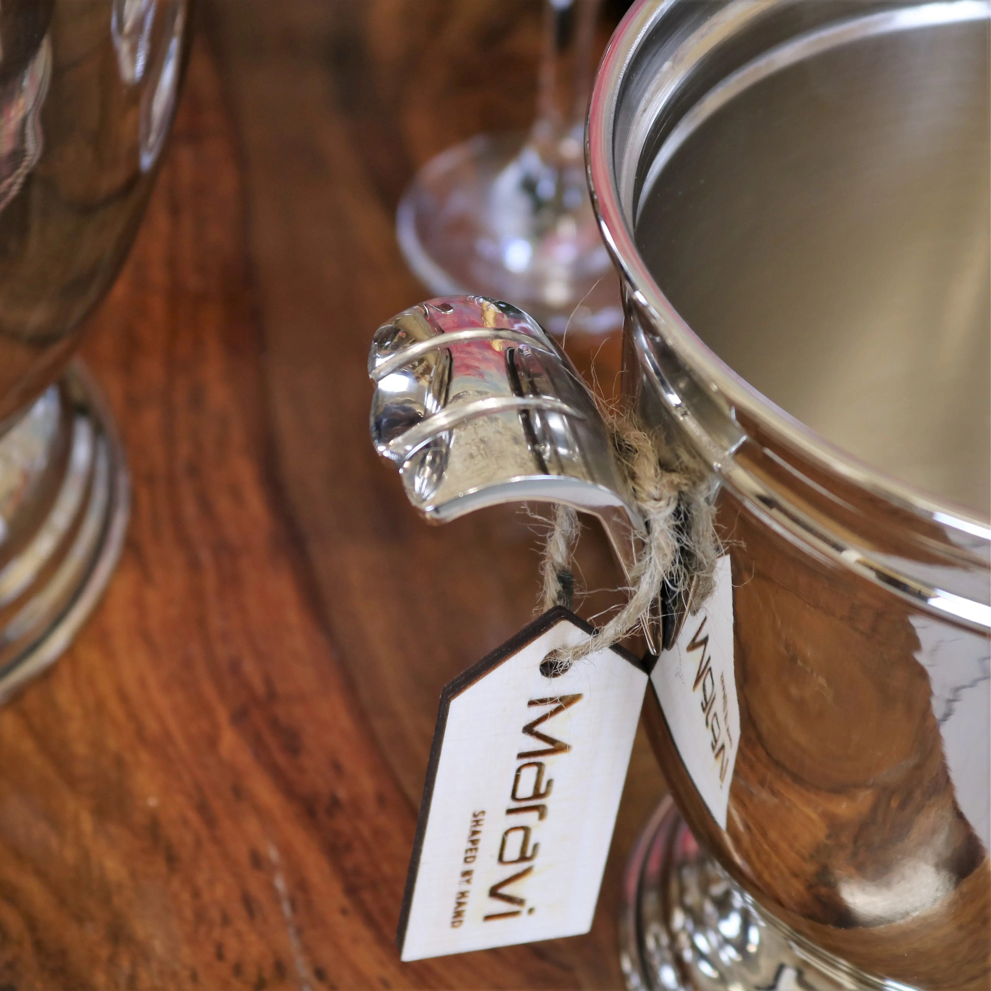 Silver metallic lehal champagne bucket ice bucket set with polished reflective surface and ornate handle