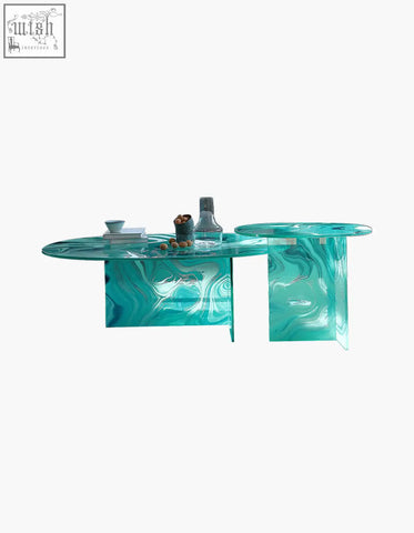 Leila coffee table made of translucent turquoise glass with white and teal marbled patterns perfect as a glass coffee table