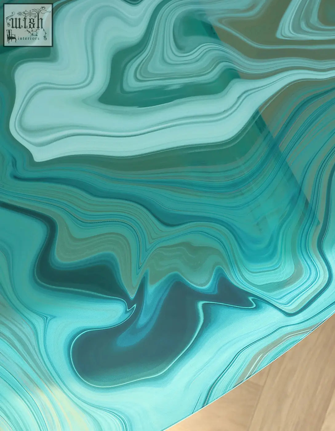 Leila glass coffee table with a sleek round nesting design and glossy teal and green marbled tabletop