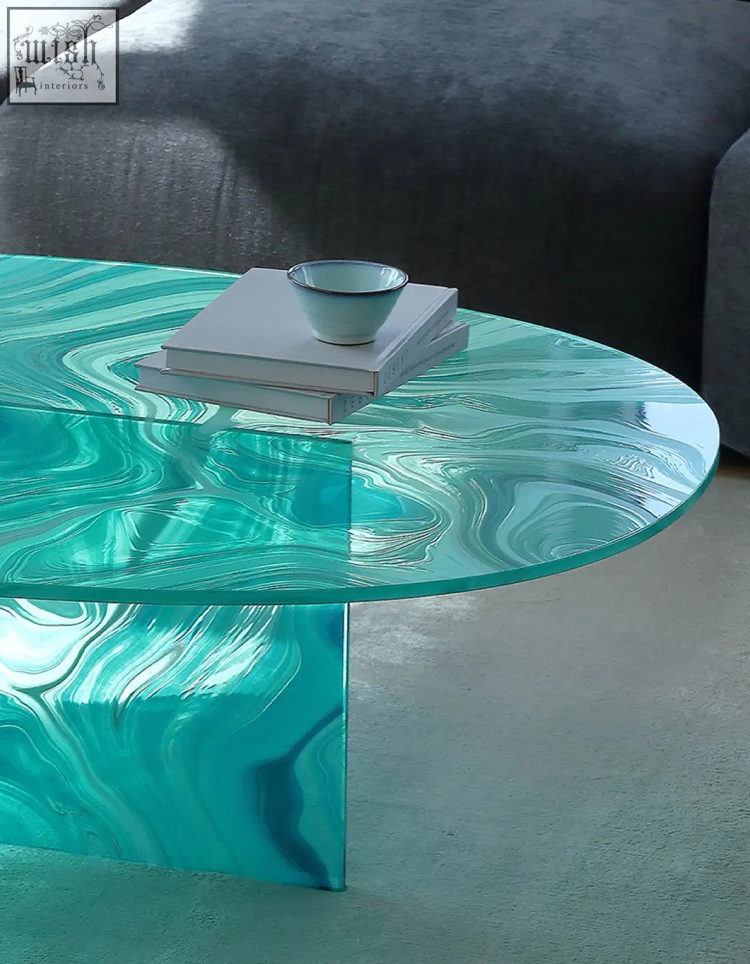 Leila glass coffee table with oval turquoise glass top and matching sculpted legs perfect as a round nesting table