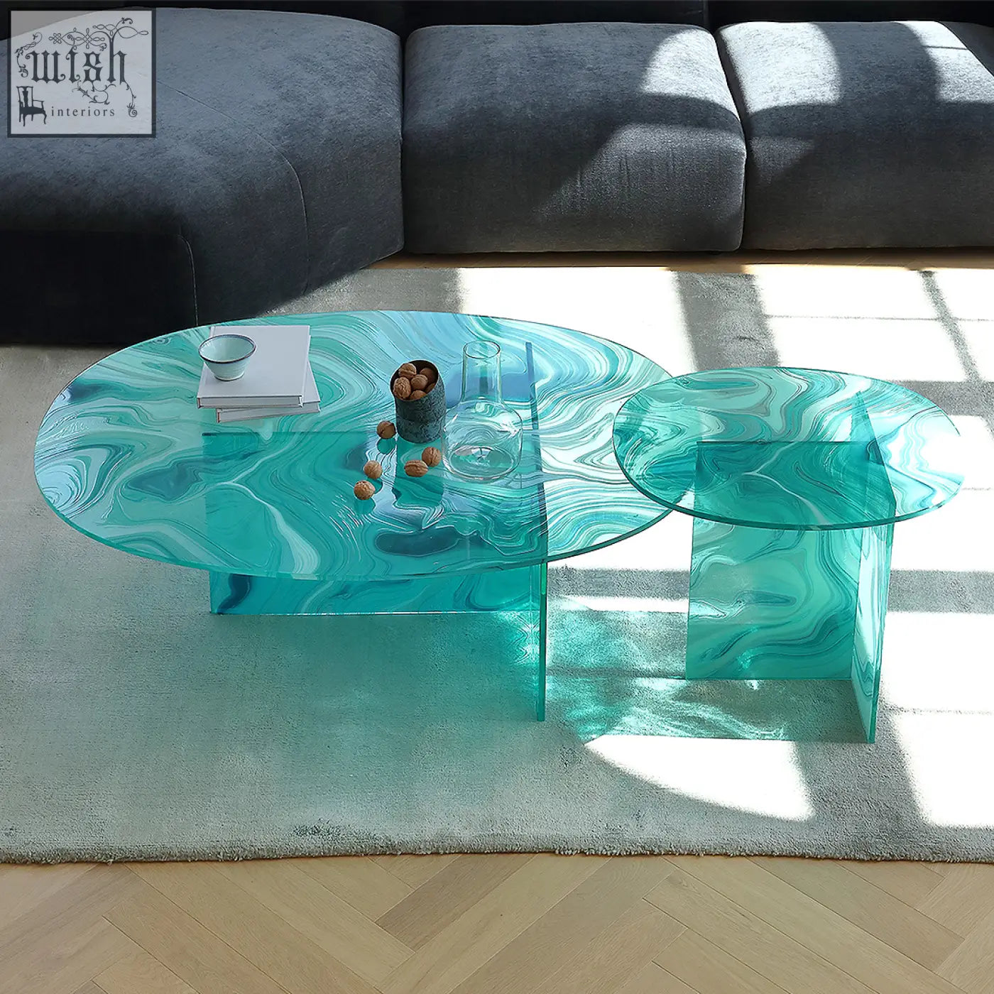 Leila teal and white marbled glass coffee table with geometric translucent bases round nesting set