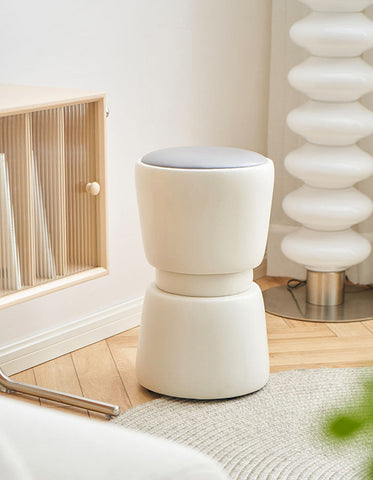 Cream-colored leather leisuremod modern boyd dressing table stool with a soft gray circular seat for comfort