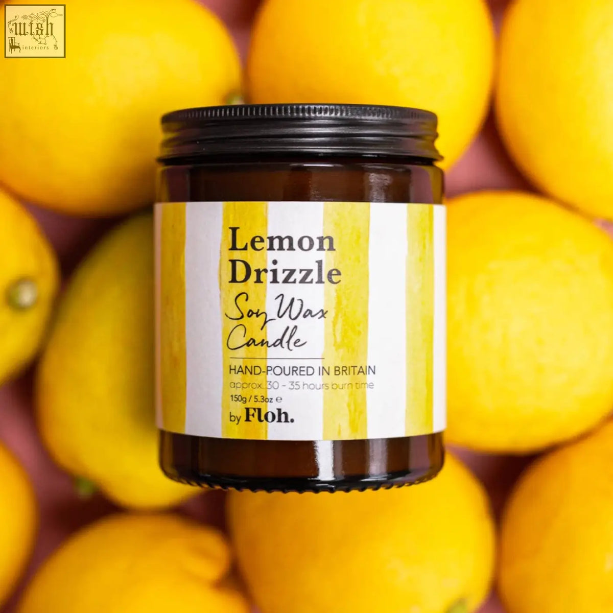 Lemon drizzle apothecary candle in dark amber jar with black lid made of natural vegetable soy wax and lemon scent