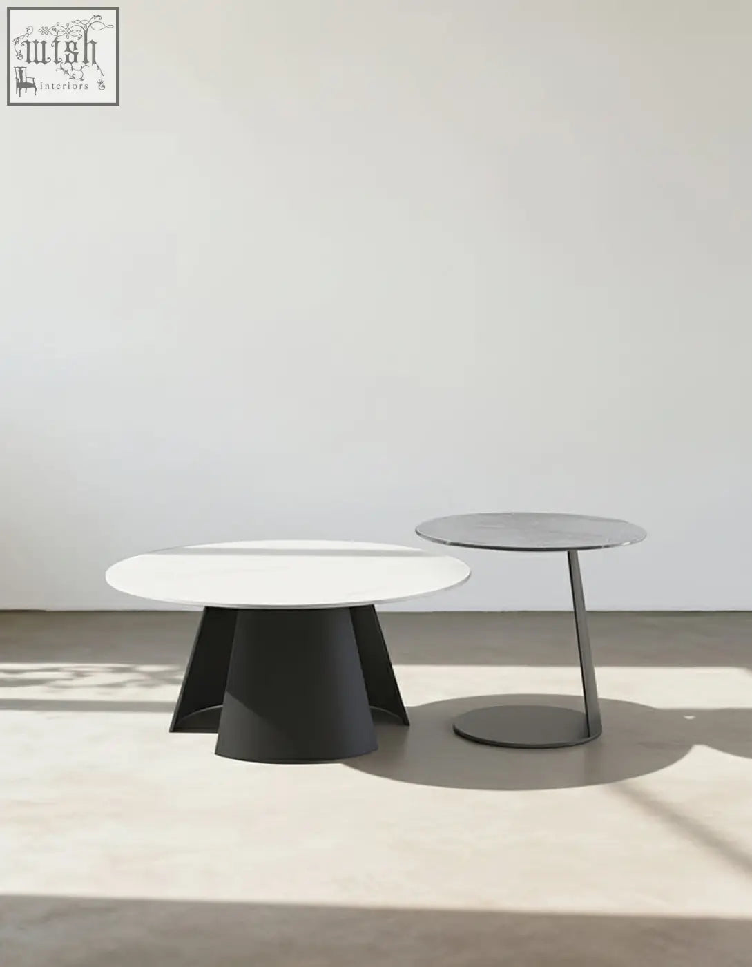 Minimalist black and white leonor nesting coffee tables with steel base and sleek modern nesting coffee table design