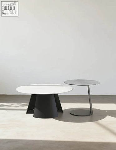 Minimalist black and white leonor nesting coffee tables with steel base and sleek modern nesting coffee table design