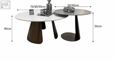 Modern minimalist leonor nesting coffee table with white marble top and dark wood tapered legs and steel base