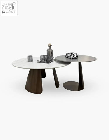 Modern leonor nesting coffee table with white marble top and dark steel base perfect for stylish living rooms