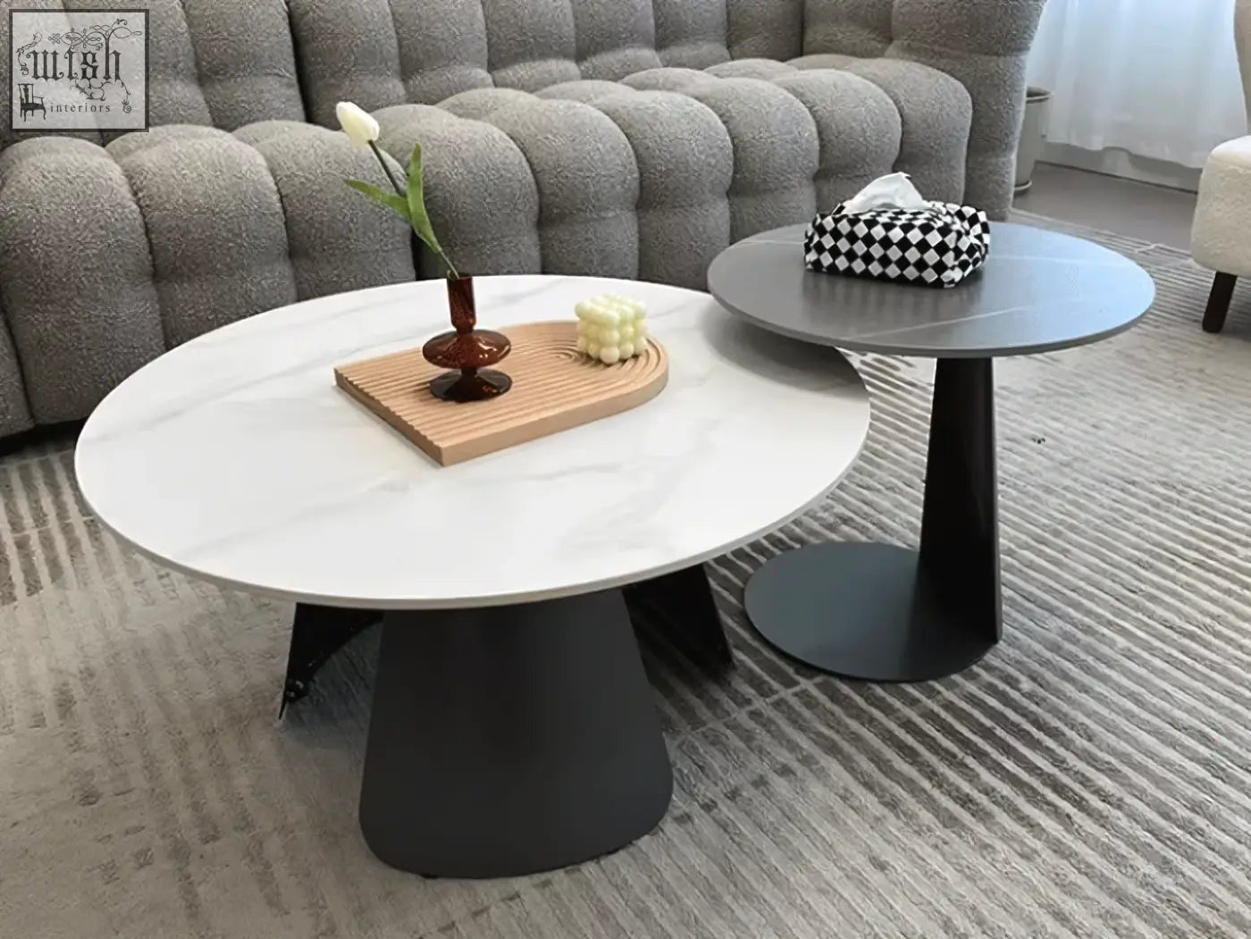 White marble top leonor nesting coffee table with sleek black steel pedestal base perfect for stylish living rooms