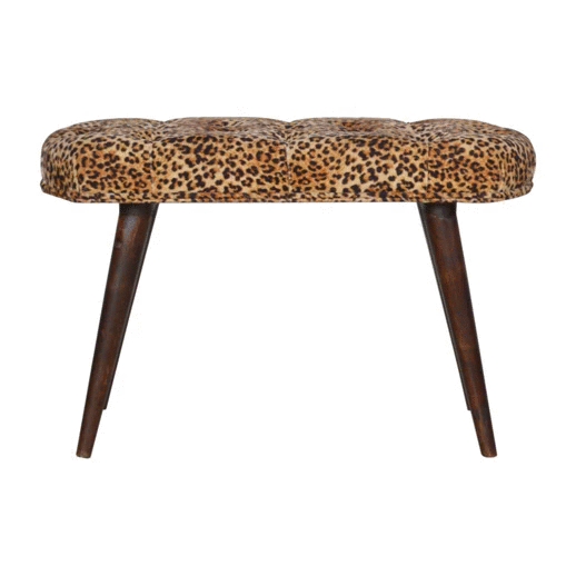Leopard print deep button tufted bench with dark wood legs perfect for stylish seating in any room