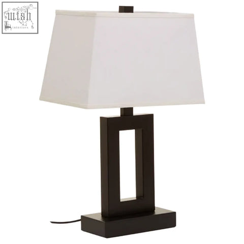 Leora black and white table lamp with a black metal rectangular base and white fabric shade for stylish lighting