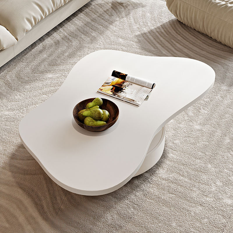A sleek white les keroro coffee table with glossy finish and curved edges perfect as a living room table