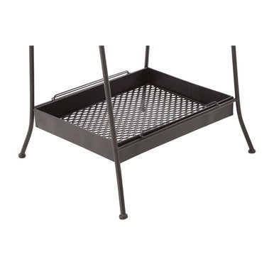 Black metal fire pit with mesh grate and four legs shown as part of lexa black metal storage rack setup