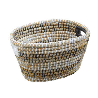 Handwoven lidi set of three oval straw baskets with beige tan and white tight textured weave in natural earthy tones