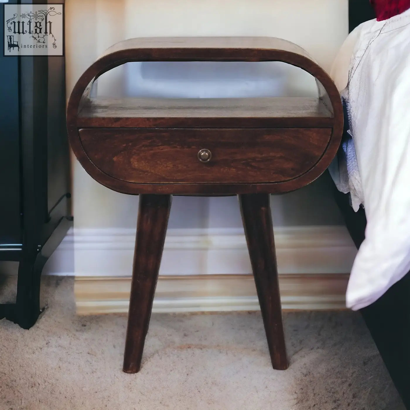 Dark wood nightstand with curved top and single drawer in light walnut open slot circular bedside table design