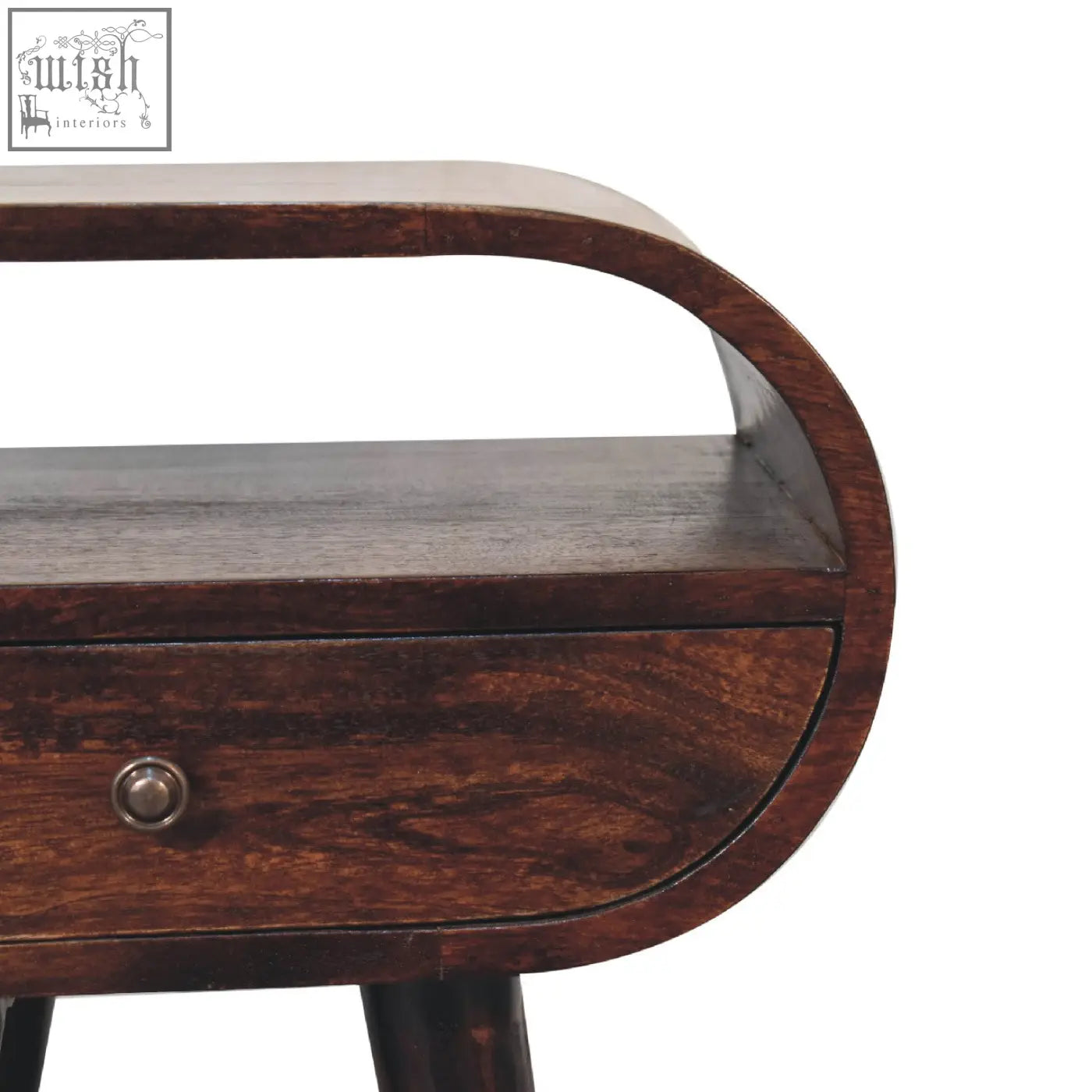 Dark wood circular bedside table with curved top drawer and round metal knob featuring open slot design in light walnut