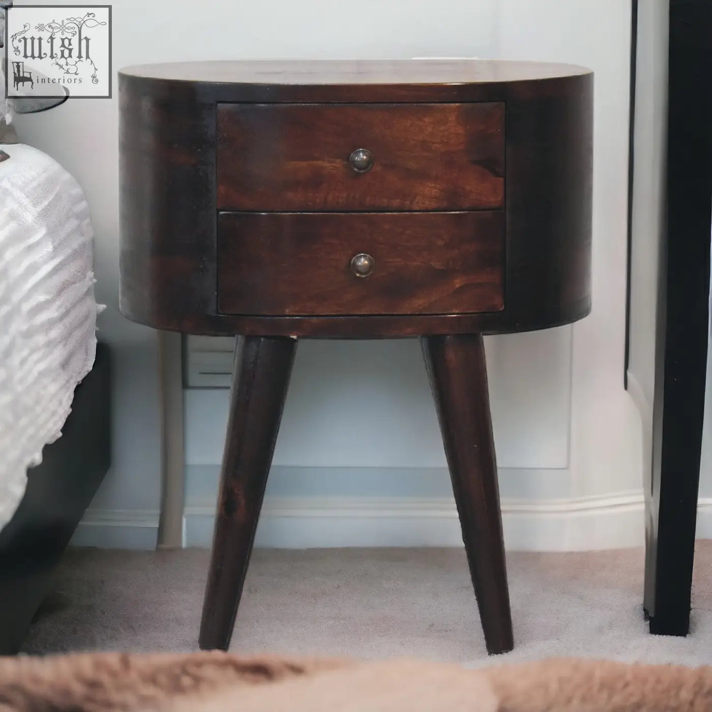 Dark wood nightstand with two drawers and tapered legs in light walnut finish mango wood bedside table
