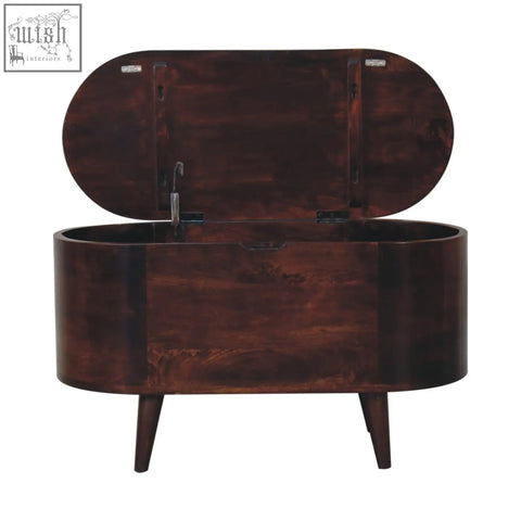 Dark brown wooden blanket box with rounded lid-up design and tapered legs for light walnut linen storage