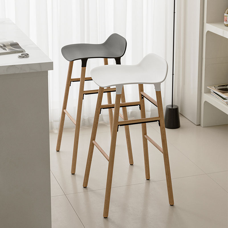 Lila Sketchy bar stool with modern white and gray curved plastic seats and light wood legs for stylish seating