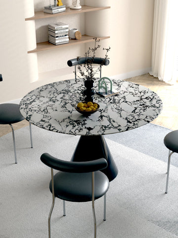 Lillian round dining table with black and white marble pattern and sleek tapered black pedestal base round dining table