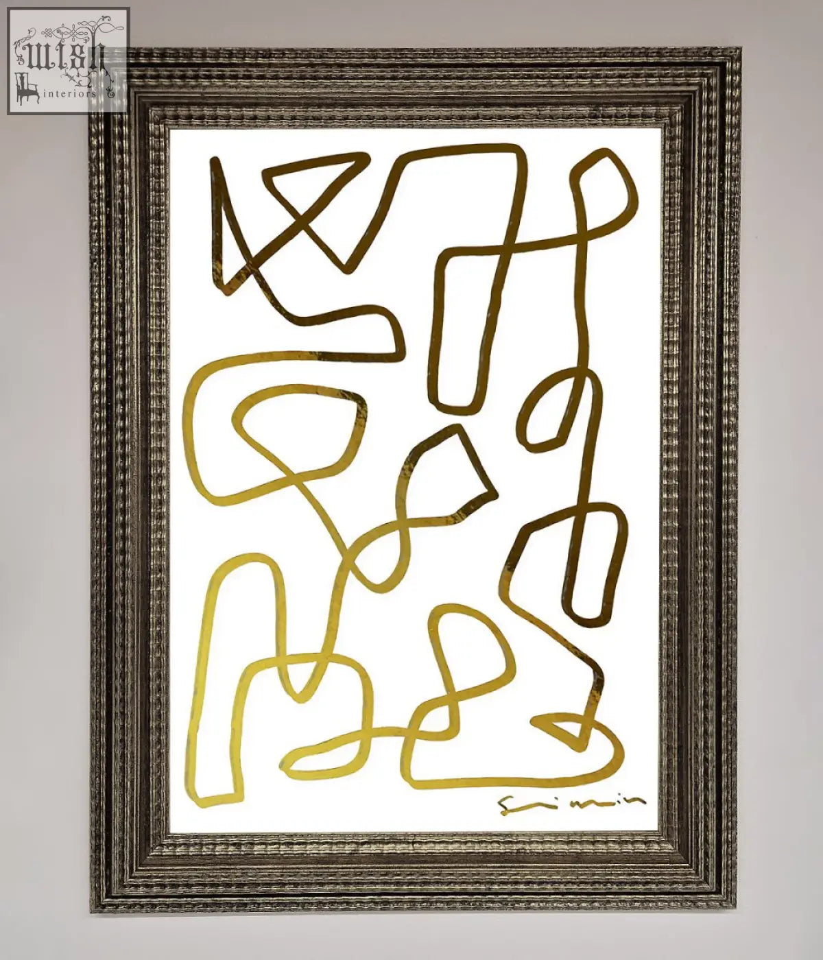 A framed abstract line squiggle foil print with gold-toned flowing line art on a white background