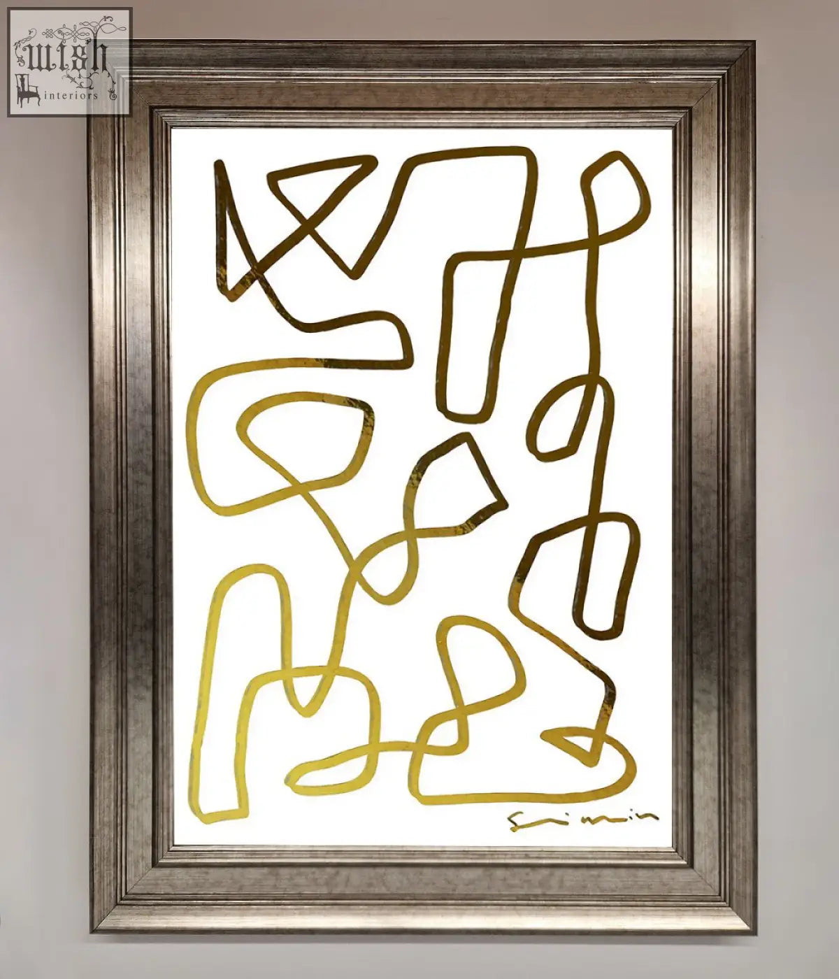 A framed abstract line squiggle foil print with gold-toned flowing lines on a white background