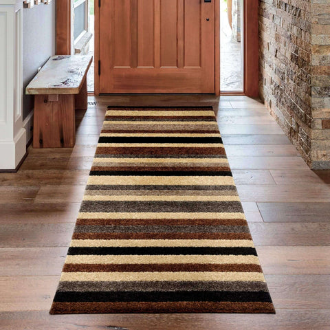 A linea striped caramel washable runner rug with beige brown and black stripes perfect for high traffic areas
