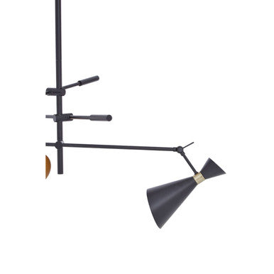Black matte adjustable arm lamp with conical shade and brass accent complementing shade black and gold pendant design