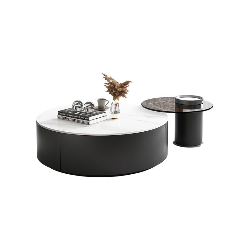 Modern black nesting coffee table with white marble top in the lionel round nesting coffee table set
