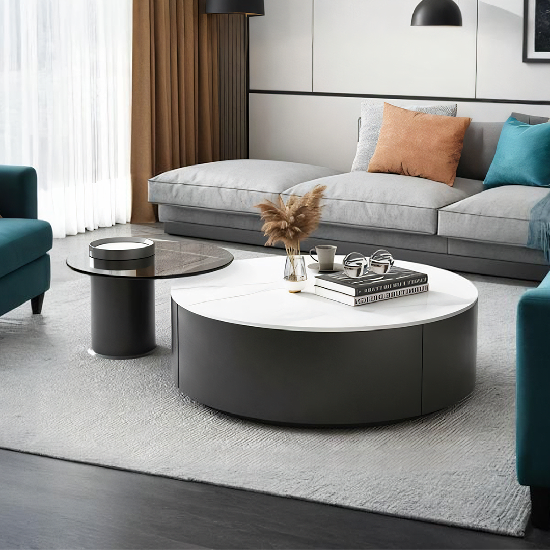 Modern round nesting coffee table set with white marble top and dark gray cylindrical base perfect for living rooms