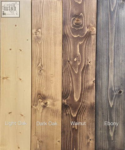Four vertical wood planks showing different stained finishes for a live edge foldable solid wood wall table