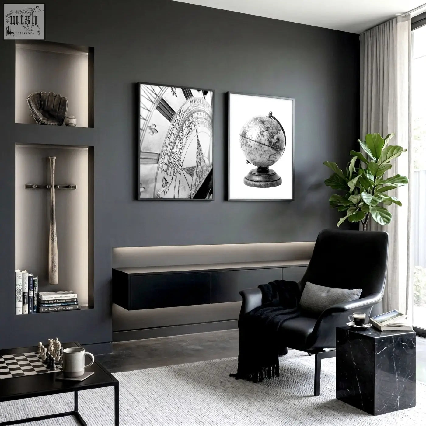 Black leather armchair with gray cushion and black fringe blanket next to living room framed vintage sundial and globe wall art set