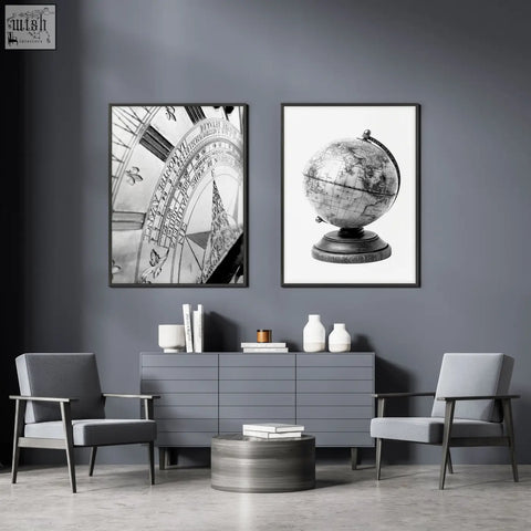 Black and white living room framed wall art featuring vintage sundial and antique globe prints above console table